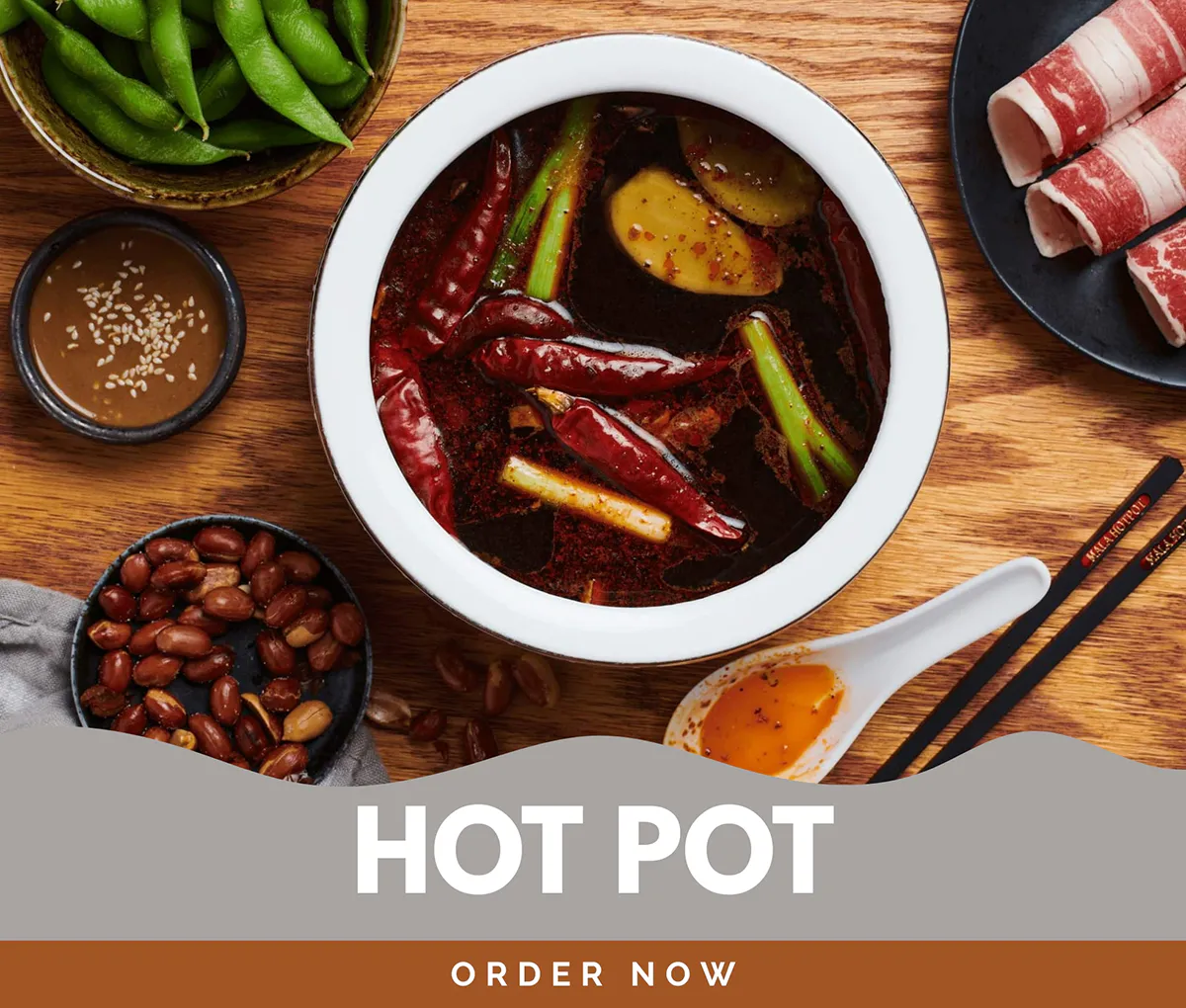 Hot pot set with vegetables, meat, and broth
